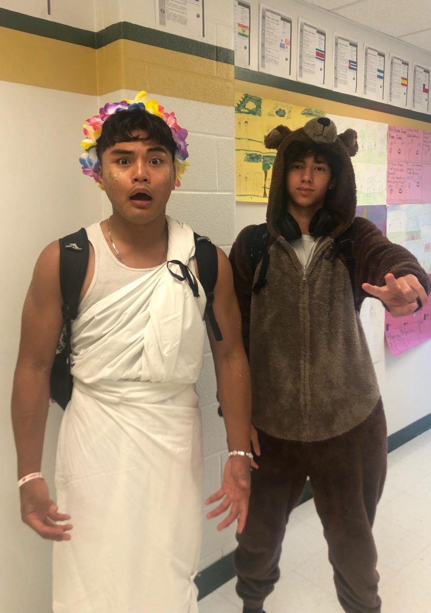 Ethan Salayon (left) and Adin Babb (right) pose for a fun photo on Costume Day and the traditional Seniors-Only Toga-Tuesday